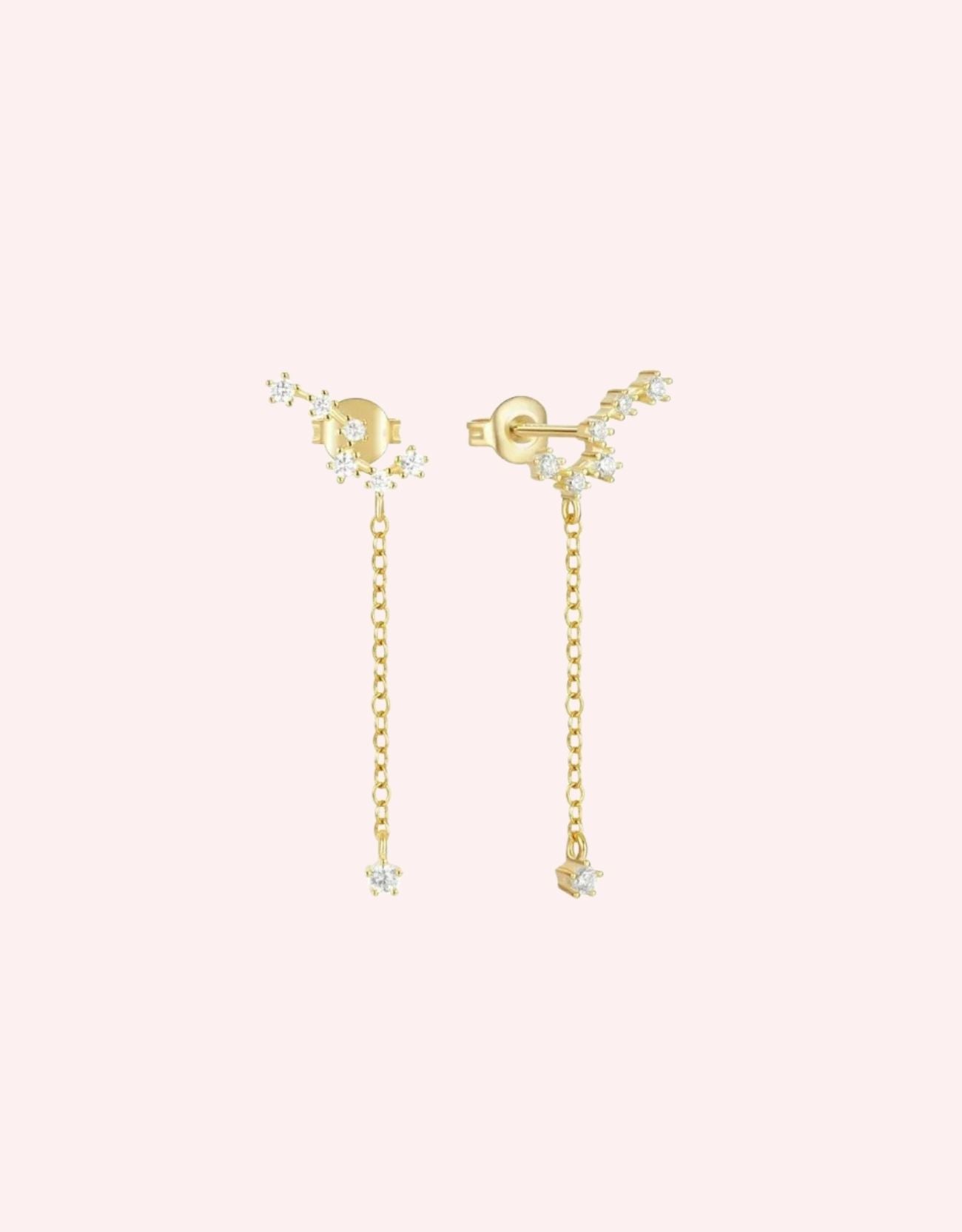 Gorgeous crystal stud earrings crafted from gold-plated sterling silver, adorned with sparkling gemstones for an elegant touch. These timeless studs feature secure closures and high-quality materials, perfect for adding a touch of luxury to any ensemble