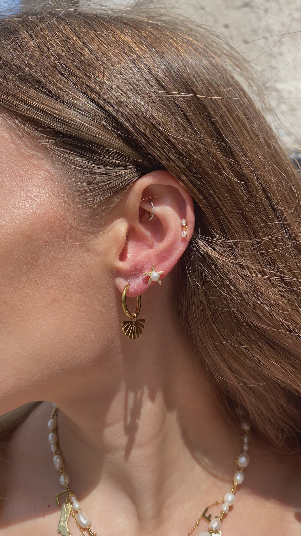 Santorini Studs, Oceanic Elegance, Exquisite Jewelry, Starfish Silhouettes, Delicate Pearl Embellishments, Stud Earrings, Aegean Inspiration, 18k Gold-Plated Sterling Silver, Crystal Starfish, Hypoallergenic Jewelry