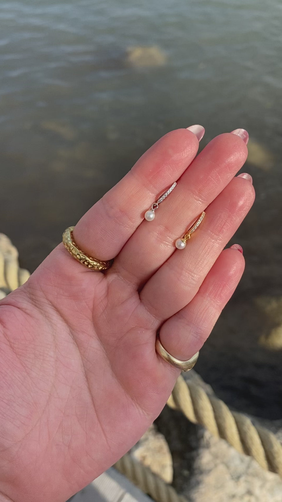 Mini Pearl Earrings, Huggie Hoop Earrings, Gold Plated Earrings, Elegant Jewelry, Pearl Love, Dainty Earrings, Everyday Luxury, Fashion Accessories, Classic Style, Minimalist Jewelry, Statement Earrings, Pearl Huggies, Versatile Earrings, Must-Have Earrings, Gold Accents, Timeless Beauty, Chic Earrings, Pearl Glam, Modern Pearls, Jewelry Lover